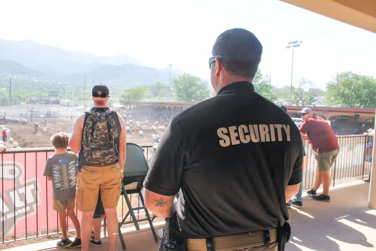 security guard watching a field