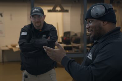 Adrian talking to an employee