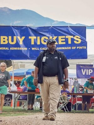 security guard walking through outdoor event