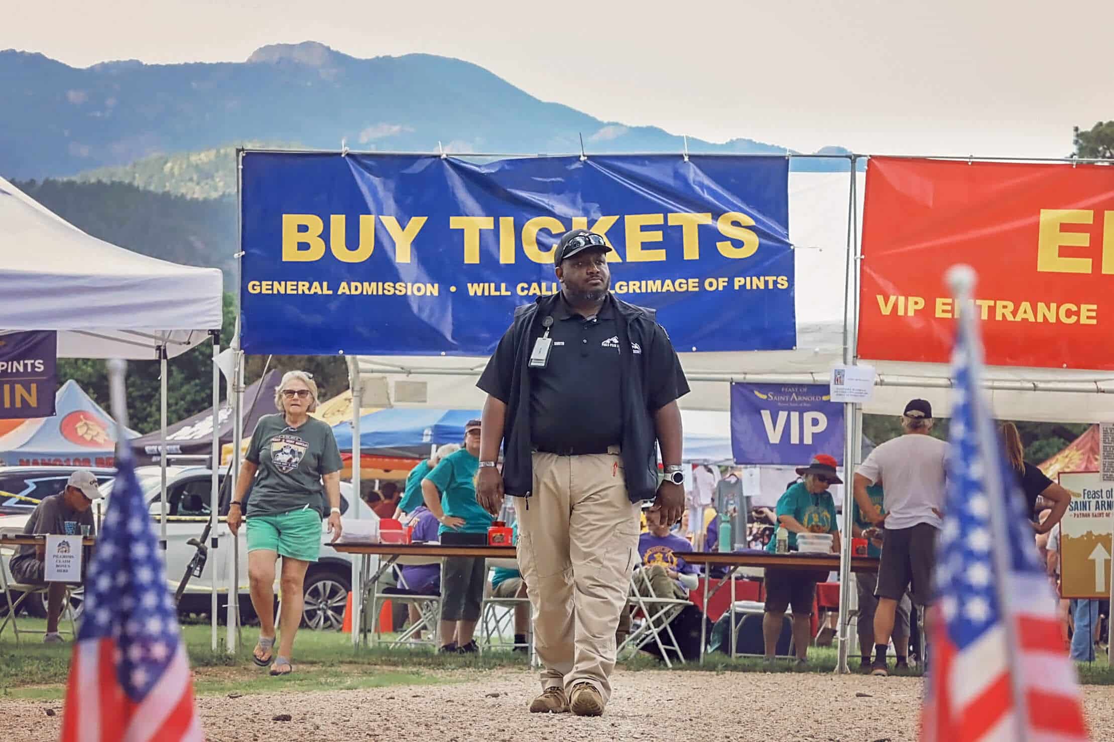 security guard walking through outdoor event